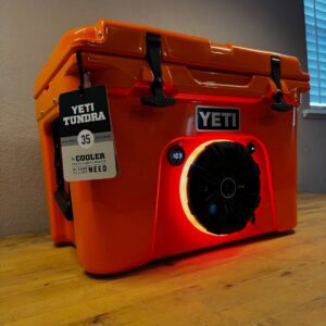 Custom YETI Tundra 35 cooler with built-in speaker system and LED lighting designed for outdoor use