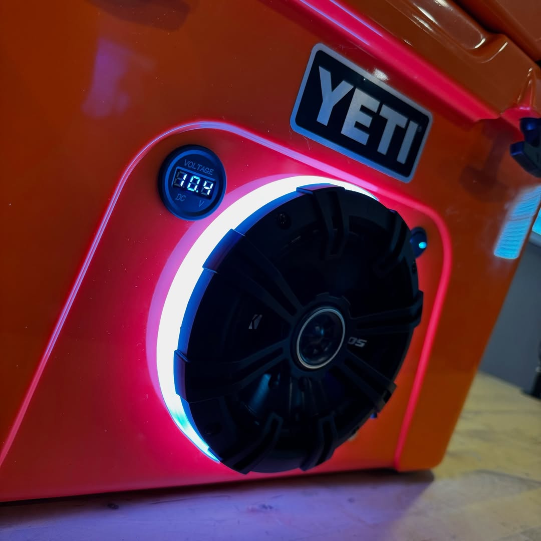 Custom YETI Tundra 35 cooler with built-in speaker system and LED lighting designed for outdoor use