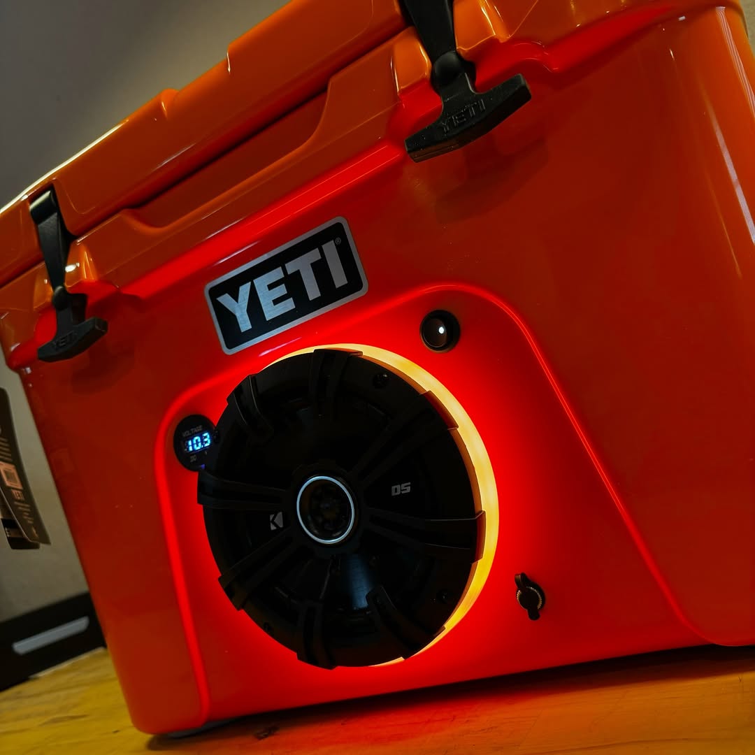 Custom YETI Tundra 35 cooler with built-in speaker system and LED lighting designed for outdoor use