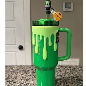 Starbucks Stanley Pearl Green Quencher 40oz with slime sleeve and straw topper Halloween tumbler