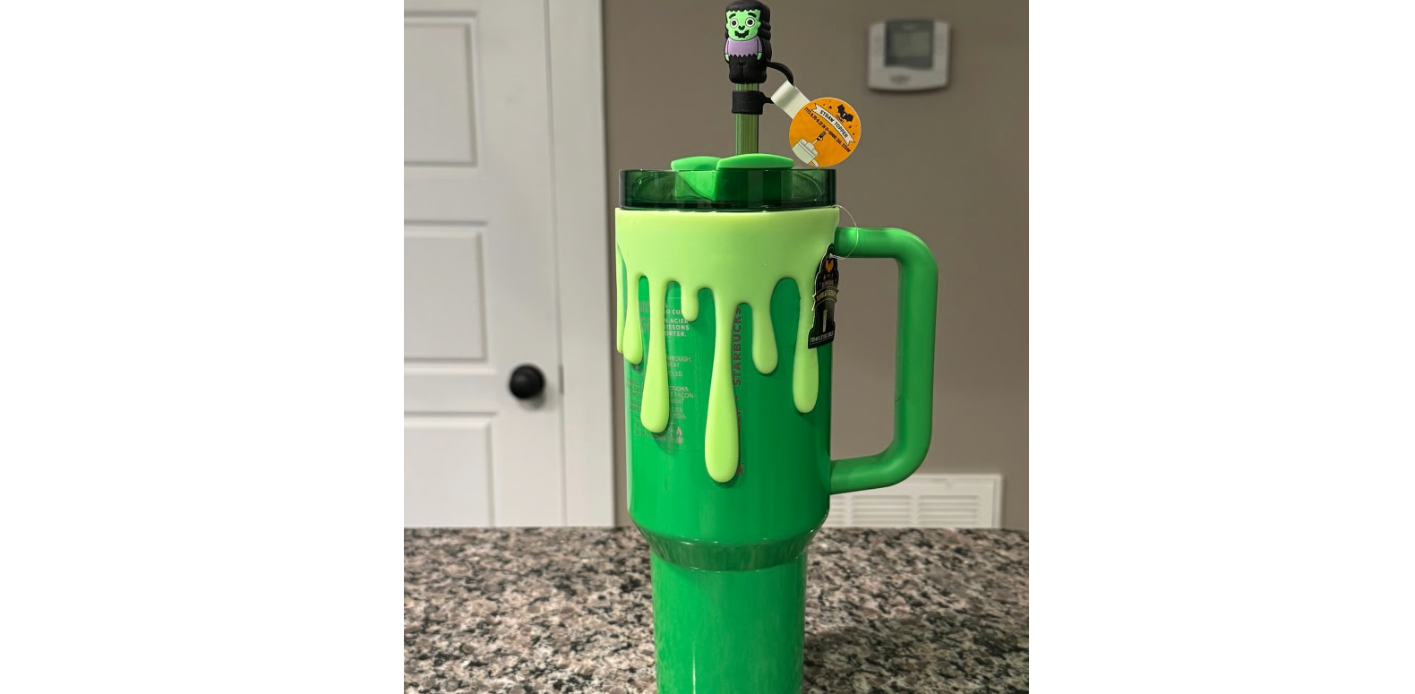 Starbucks Stanley Pearl Green Quencher 40oz with slime sleeve and straw topper Halloween tumbler
