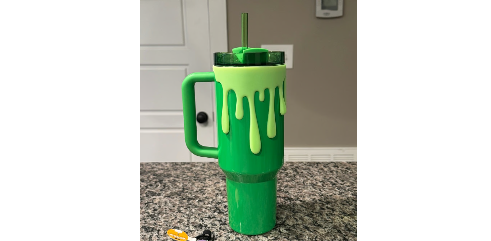 Starbucks Stanley Pearl Green Quencher 40oz with slime sleeve and straw topper Halloween tumbler